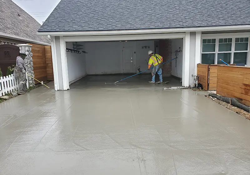 Garage and Driveway Pour Fresh Concrete